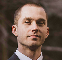 トレーディングアナリスト Thomas Whitfield の肖像 暗号通貨市場の専門家